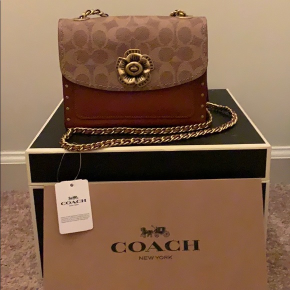 coach parker 18 in signature canvas with rivets